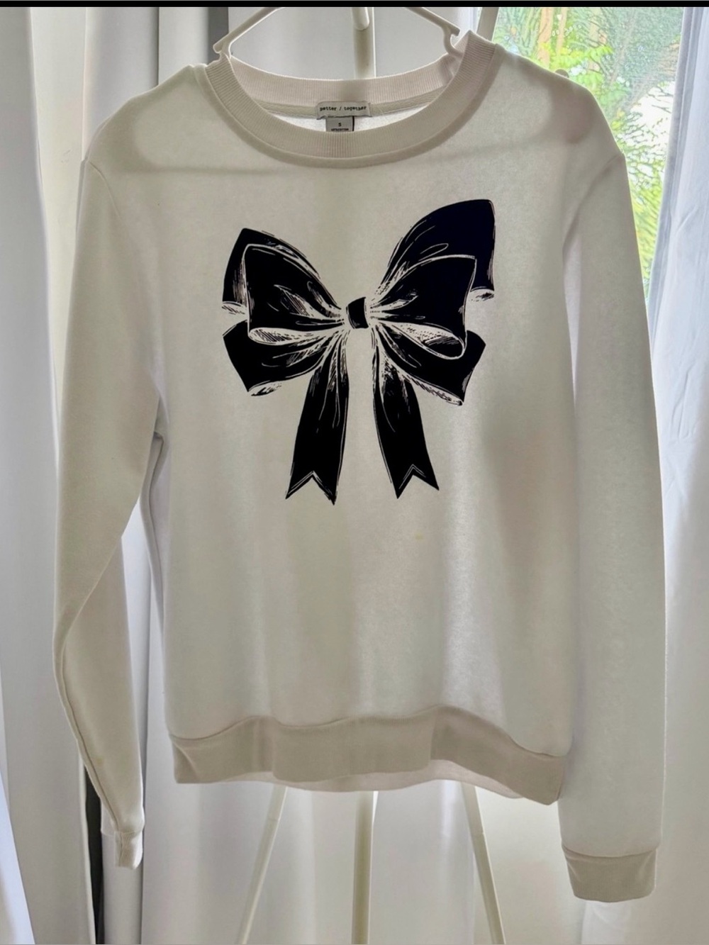 Cream Crewneck Sweatshirt with Black Bow Graphic - Women